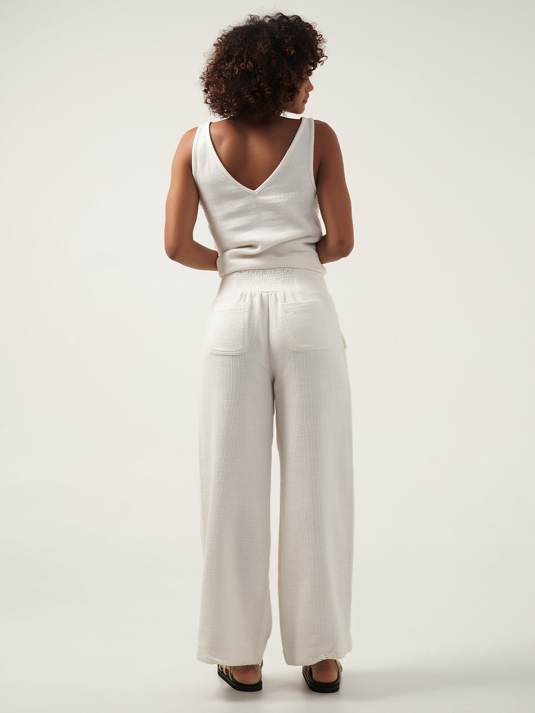 Model is wearing Sula Ramie Pants in Ivory