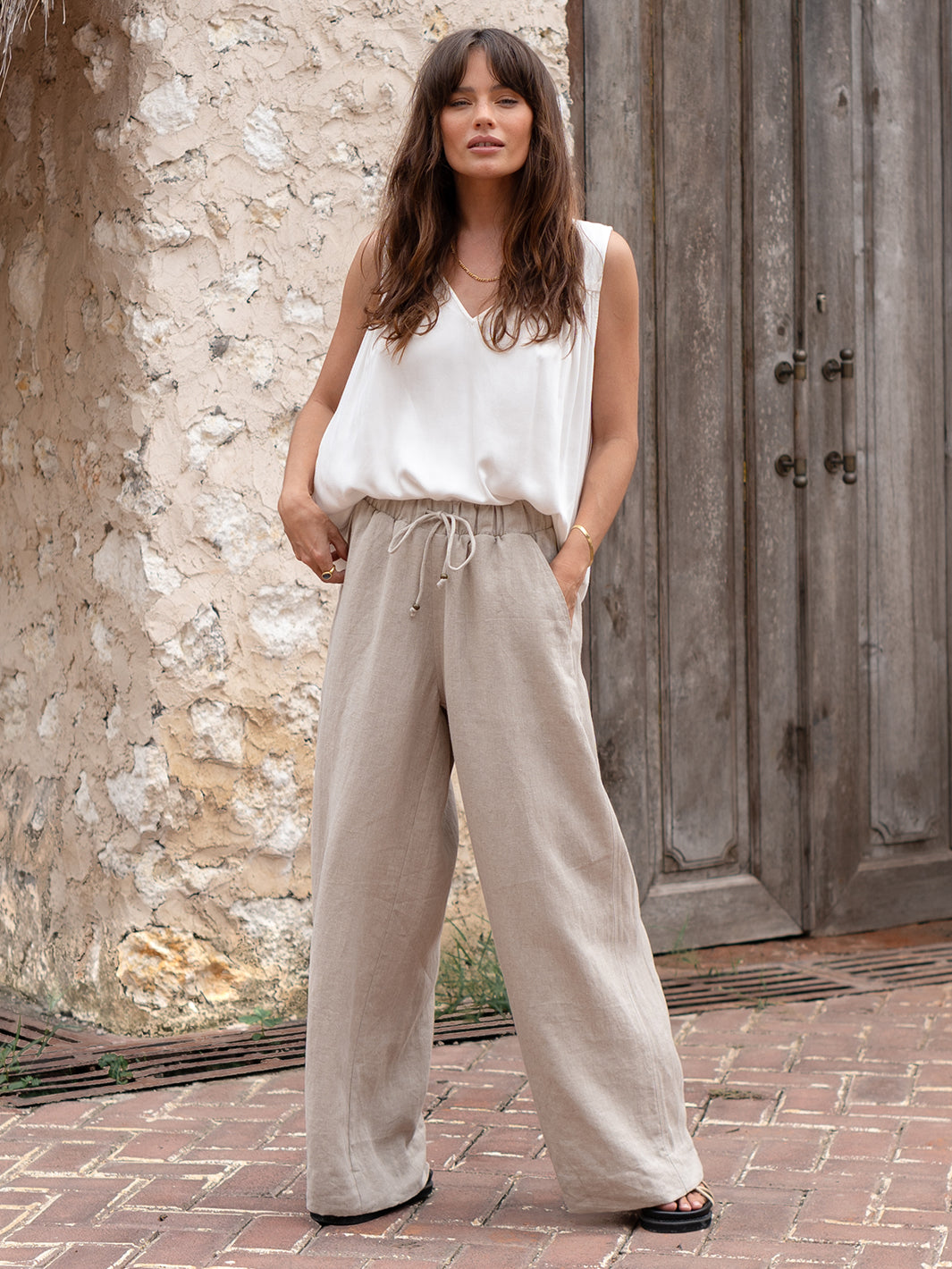 Model is wearing Sundara Linen Pants in Flax