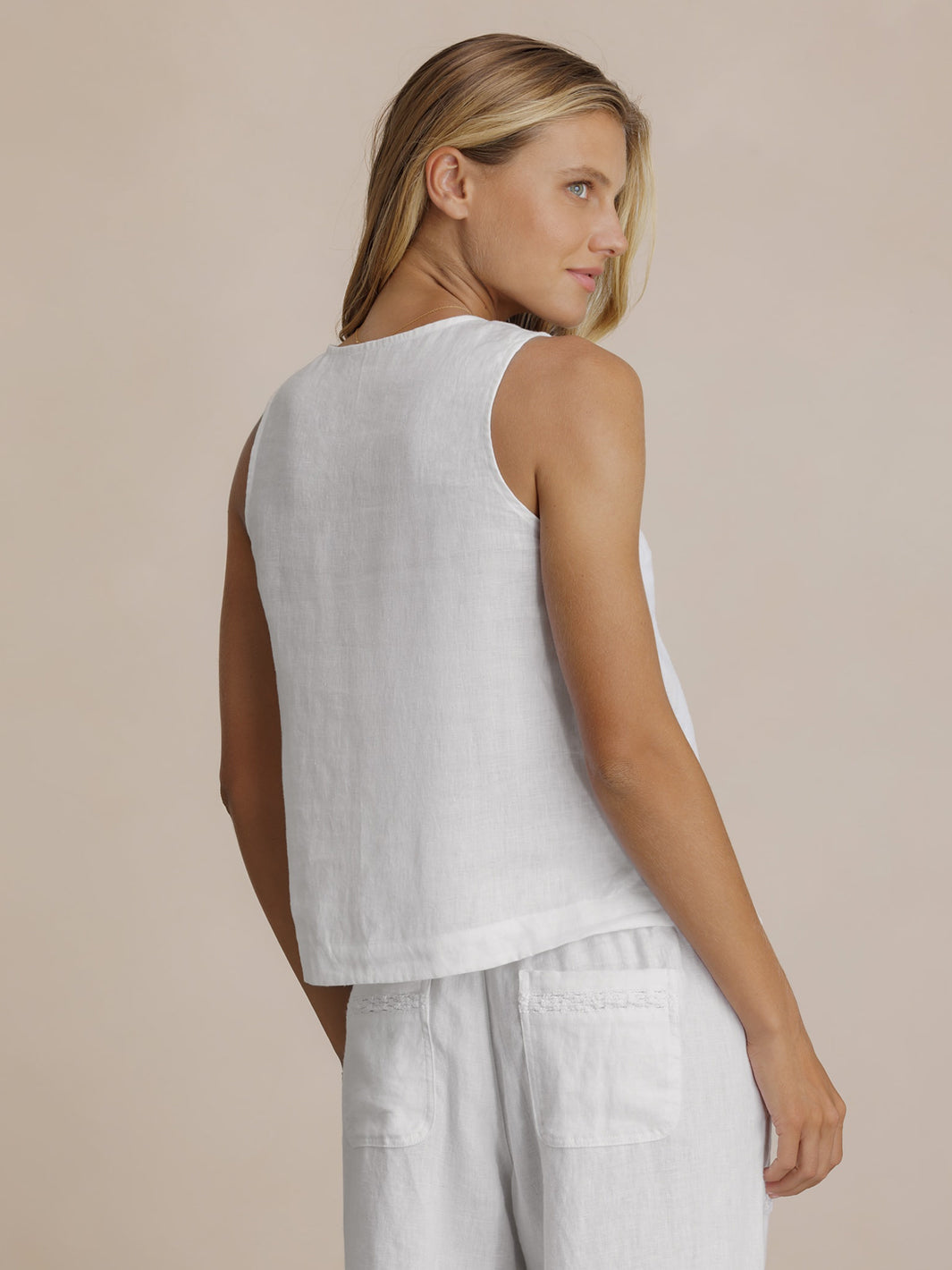 Model wears Suvi Linen Top in White