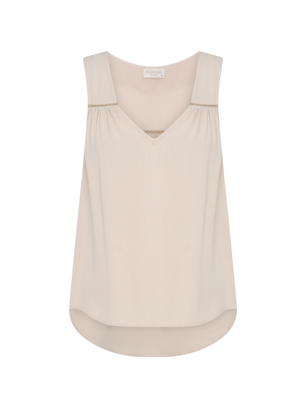 Beige sleeveless top on a white background