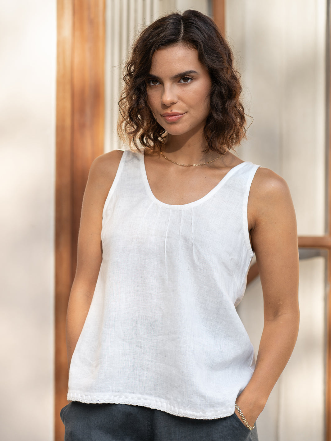 Model wears Tuscan Linen Top in Ivory