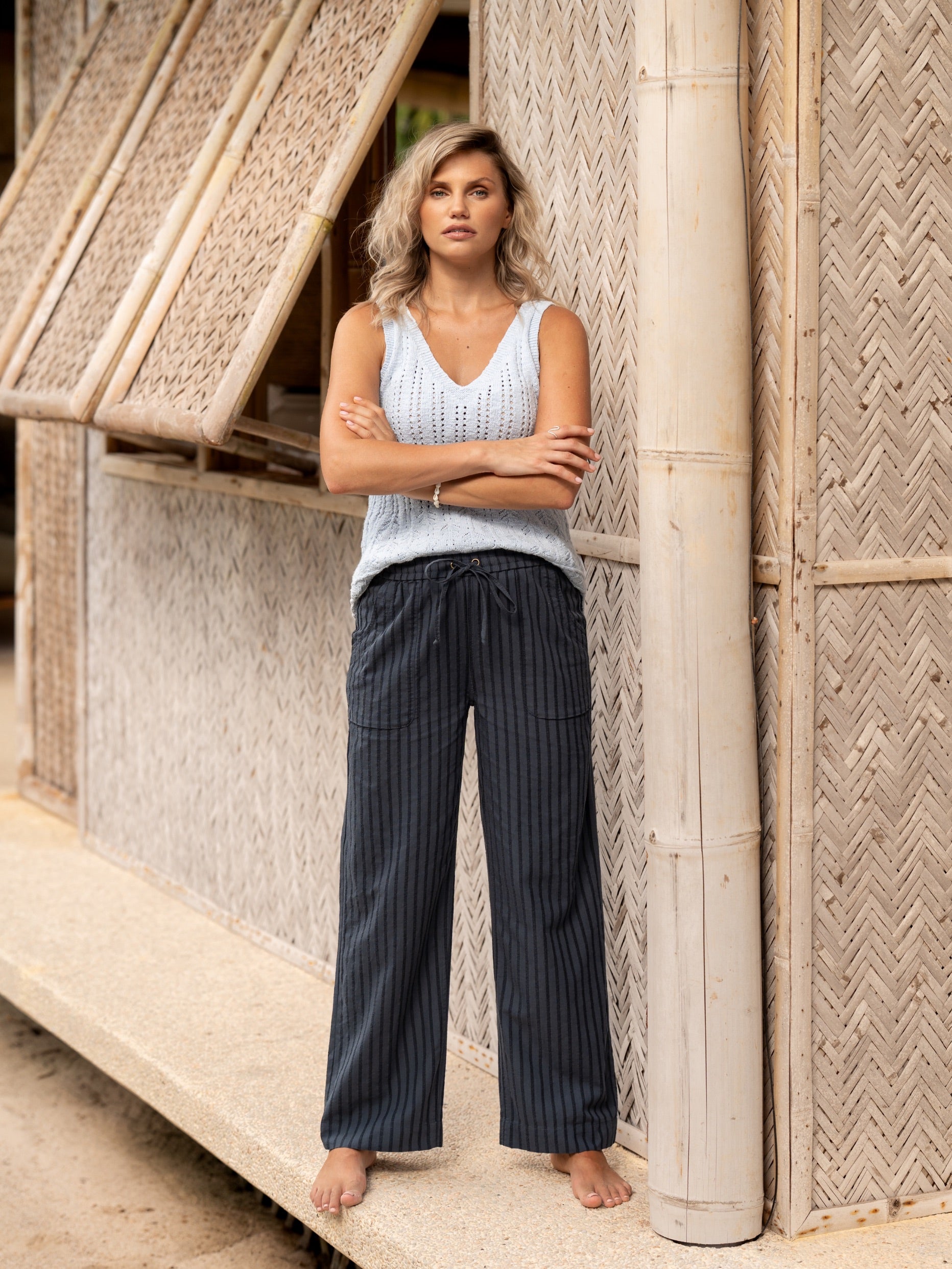 Woman wearing Sidari Organic Cotton Pants Charcoal from Nomad the Label