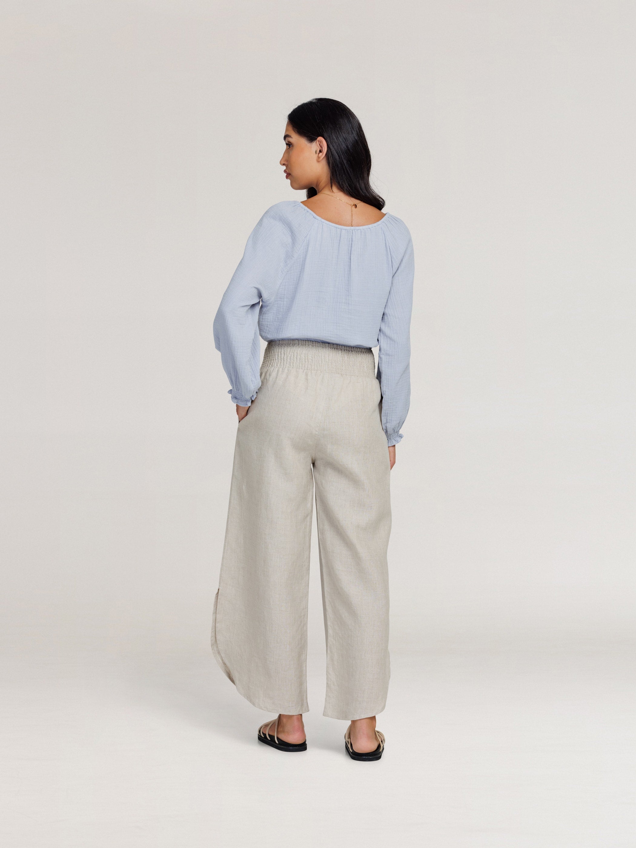 Model wears Sienna Linen Pants in Flax