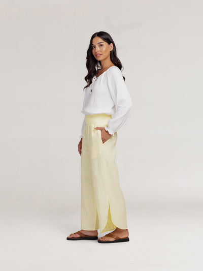 Model wears Sienna Linen Pants in Lemon